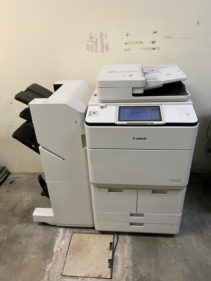 Canon multifunction printer with finishing unit installed at a client office
